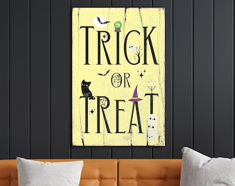 May include: A yellow wooden sign with the text "Trick or Treat" in black lettering. The sign is decorated with Halloween-themed illustrations, including a black cat, a witch's hat, a ghost, and bats.
