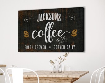 May include: Black and white sign with the text "Jacksons Coffee Est. 2021 Fresh Brewed Served Daily" with brown coffee bean illustrations.