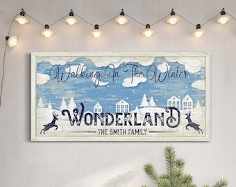 May include: A blue and white winter wonderland scene with the text "Walking in the Winter Wonderland - The Smith Family". The scene features a snowy landscape with houses, trees, and deer.