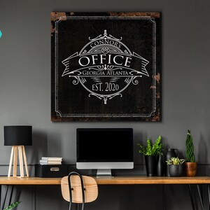 May include: Black and white office sign with a distressed, rusty background. The sign reads "Connors Office Georgia Atlanta Est. 2020".