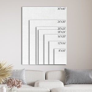 May include: A white canvas with different sizes marked on it, ranging from 8x10 inches to 30x40 inches.