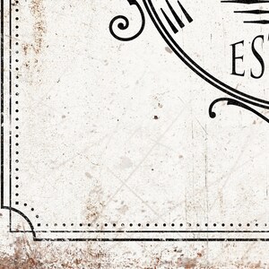 May include: A white background with a black and white decorative border. The border has a dotted line and a curved design. The text "EST." is in the upper right corner.
