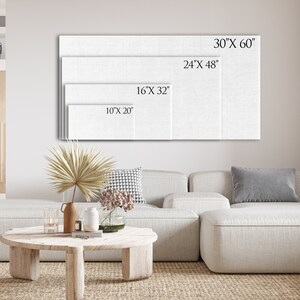 Puede incluir: Un lienzo blanco con diferentes tama&ntilde;os marcados en &eacute;l, mostrando los diferentes tama&ntilde;os disponibles para la compra. Los tama&ntilde;os son 10" x 20", 16" x 32", 24" x 48", y 30" x 60".