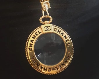Chanel authentic golden magnifying glass pendant year 80