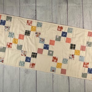 Quilty Table Runner 14” X 41” +/- (1 1/2 inch squares)