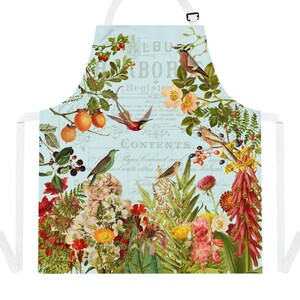 May include: A blue and white apron with a floral and bird design. The apron has a vintage aesthetic and features the text "EBU BOR Register CONTENTS Pages Cabinet and sed with other".