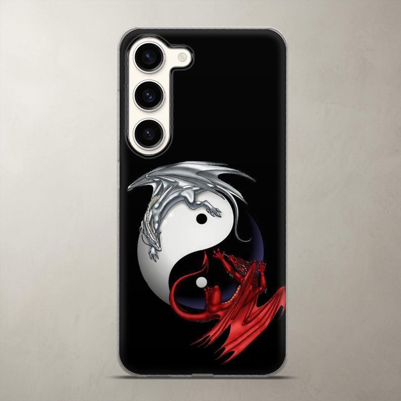 Dark aesthetic phone case featuring a silver and red dragon wrapping around a yin-yang symbol on a black background for Samsung Galaxy. Precision-cut clear silicone protects your device from drops while keeping heavy-duty camera blocks free. Excellent everyday cover for fans of ancient mythology and gothic art