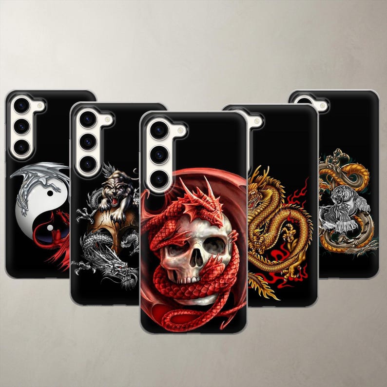 Five dark fantasy phone cases for Samsung Galaxy devices featuring epic dragon and skull designs on a solid black background. Made of clear shockproof TPU silicone to protect your tech from drops. Perfect gothic aesthetic gift for gamers and fantasy fans. Accurately scaled to fit modern models like the new S26 Ultra and A17