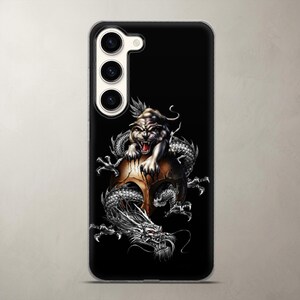 Gothic phone case showcasing a fierce dark beast hybrid on a solid black background, shown on a Samsung Galaxy. Crafted from sturdy clear TPU silicone that absorbs shock from accidental drops while preserving the intricate dark fantasy artwork. Perfect custom fit for daily tech protection and a great gift for gamers