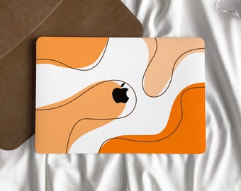 May include: A white laptop with an orange and brown abstract design. The Apple logo is visible on the laptop.