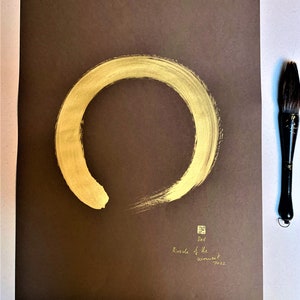 Enso Gold on brown cardboard 70 cm x 50 cm
