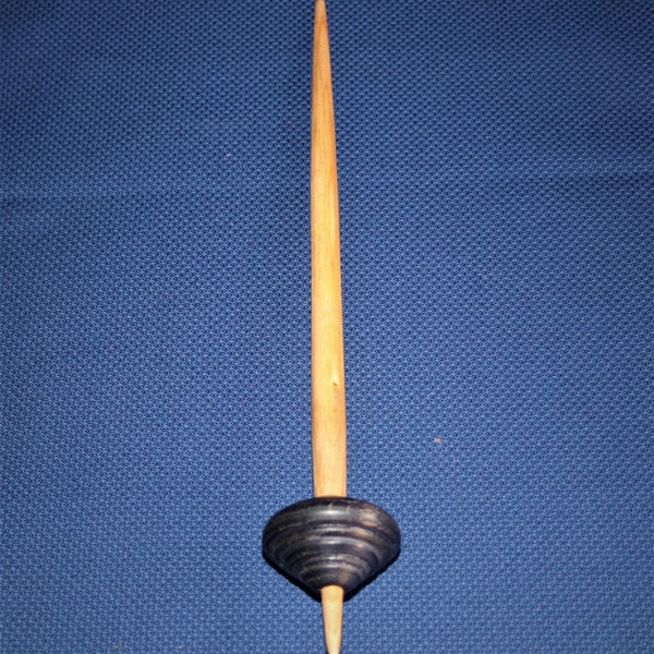 Tibetan style support spindle with coloured whorl.