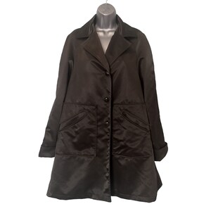 Black swing jacket top