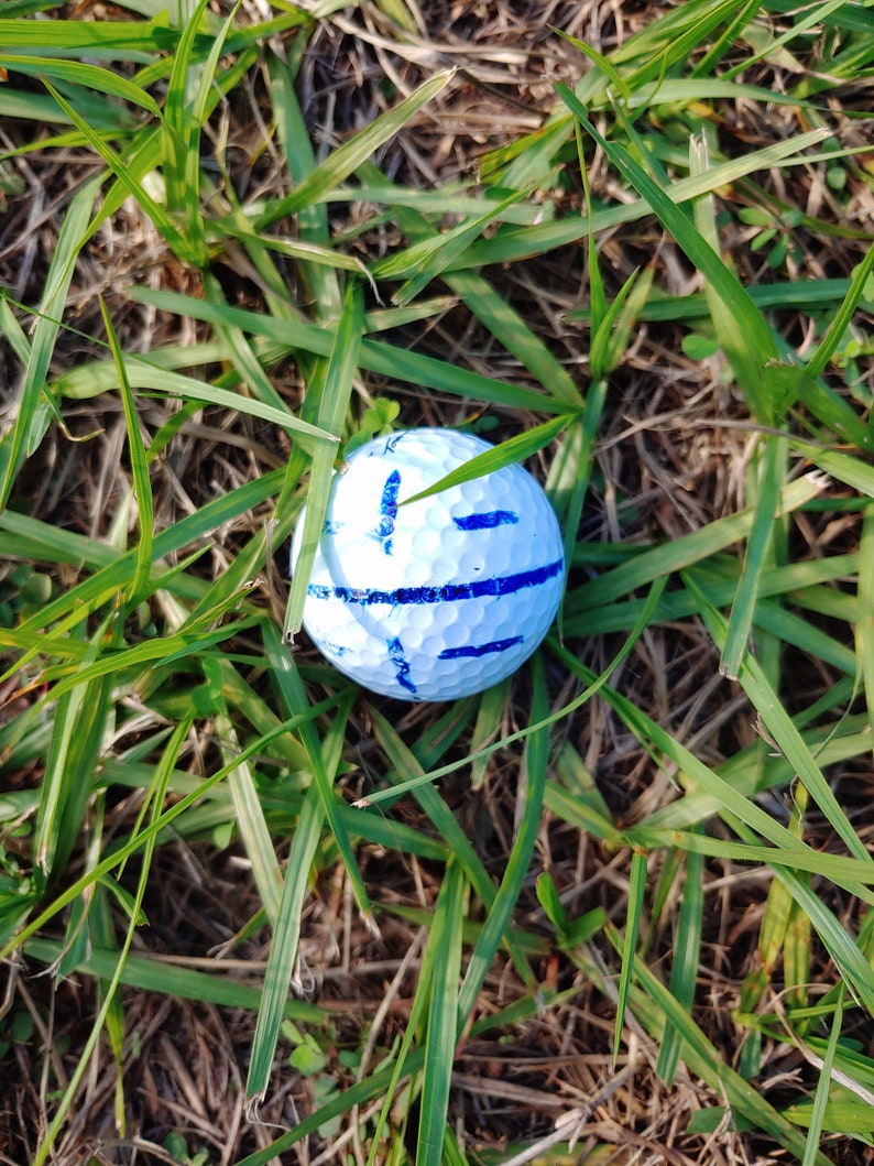 Golf ball very lucky item for luck at golf. The sporting competitions. Good luck to you for reading this nice note filled with loving note image 1