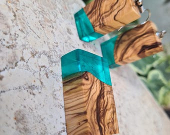 Unique jewelry set, earrings and necklace made of olive wood and resin in blue petrol color.