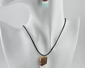 Unique little jewelry set, earrings and necklace made of olive wood and resin in light green and white color.