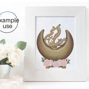 May include: A gold crescent moon with a glittery texture and a stylized Arabic calligraphy design in the center. The moon is surrounded by pink roses and green leaves on a white background.