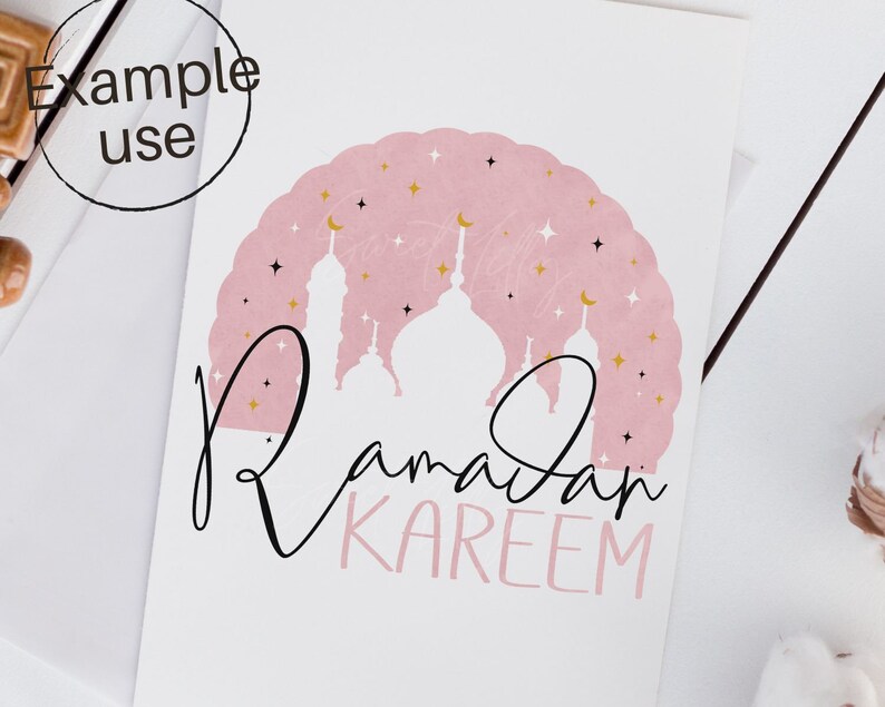 May include: Pink and gold Ramadan Kareem greeting card with a silhouette of a mosque and stars.