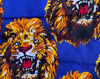 Tela africana Igbo Isi Agu / Cabeza de león, estilo Ankara, azul