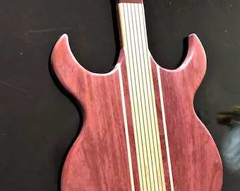 Guitar-shaped cutting board