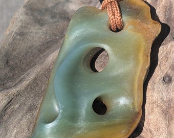 Unique "Wormhole" yellow and blue jadeite pendant