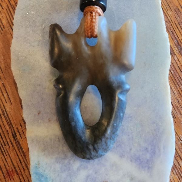 Siberian brown jade pendant carving