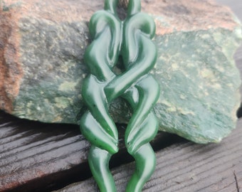 Rich green Hymalayan jade "unity twist"pendant