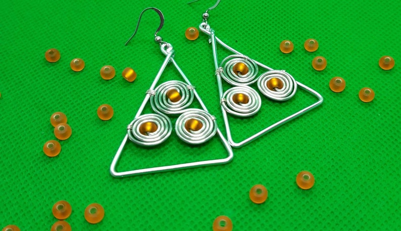 Celtic Goddess Earrings \u2022 Orange Triskelion Wire Earrings \u2022 Handcrafted Earrings