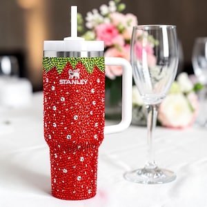 May include: A set of three ceramic mugs with a speckled, matte finish. The mugs are in shades of cream, light gray, and dark gray. Each mug has a simple, minimalist design, perfect for coffee or tea.