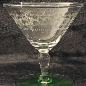 Depression "Uranium" Tall Sherbet/Champagne Glass with Needle Etching around the clear bowl and a Green Base.
