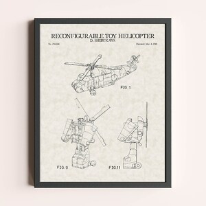 May include: A black and white line drawing of a reconfigurable toy helicopter patent. The patent is titled "Reconfigurable Toy Helicopter" and was patented on March 8, 1988. The patent shows the helicopter in three different configurations: a helicopter, a robot, and a standing figure.