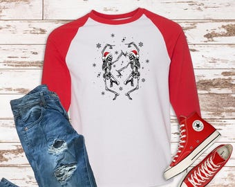Dancing Christmas skeletons with Santa hats, funny Christmas vintage style t shirt, funny womens t shirt, soft style baseball style shirt