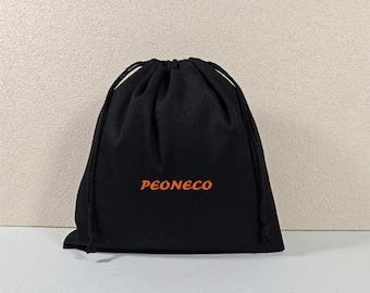 May include: A black drawstring pouch featuring the text PEONECO printed in orange on the front. The bag is made of a solid black fabric and includes two black cords that cinch the top closed, creating a gathered effect at the opening.