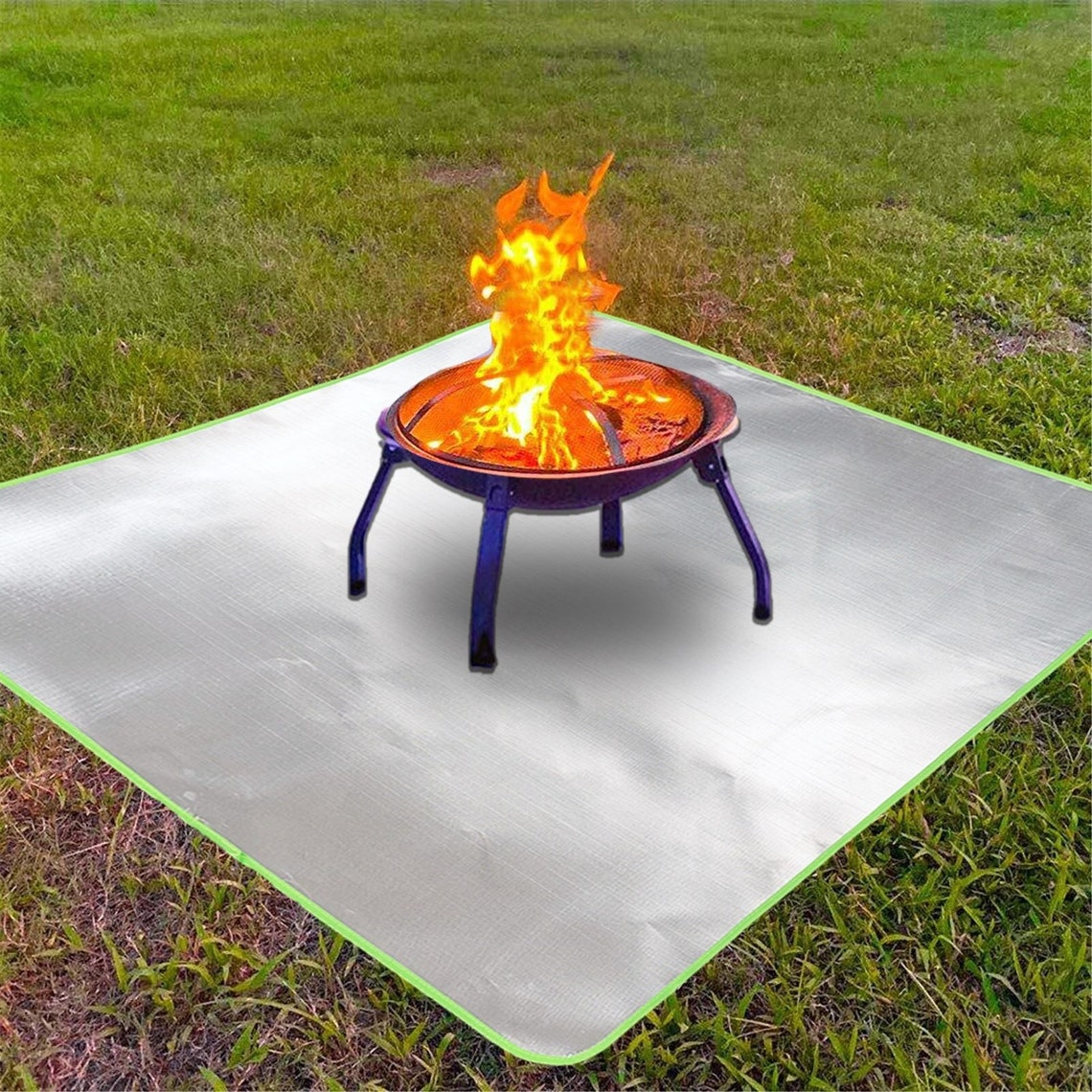 can you put a rug under a propane fire pit