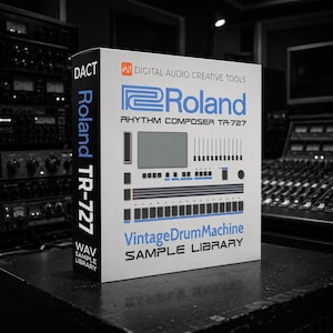 May include: A white rectangular box for a Roland TR-727 Rhythm Composer sample library. The front features blue and black text, a graphic of the drum machine interface, and the words Digital Audio Creative Tools and Vintage Drum Machine.