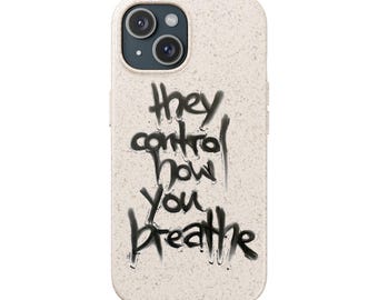 Puede incluir: Funda de teléfono beige con un mensaje negro estilo grafiti que dice "they control how you breathe". La funda tiene una superficie texturizada y un recorte para la cámara. La funda está diseñada para un smartphone.
