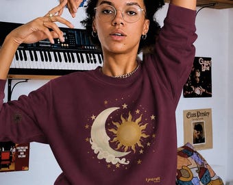 Sudadera de cuello redondo con diseño de sol y luna