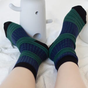 Structured cotton socks with 3D texture. Avant-garde design socks in black, moss green and orange. Airy lantern shape. Aesthetic socks.