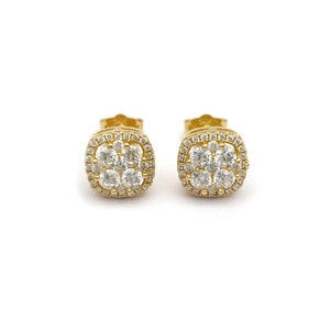 May include: A pair of gold square-shaped stud earrings with a cluster of small round clear stones in the center.