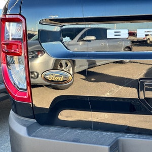 2021-2024 Bronco Sport Emblem Overlay Please read description before purchasing Change the color of the emblems on your Tailgate image 3