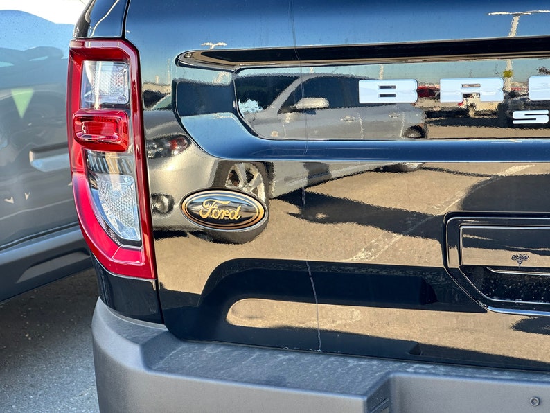 2021-2024 Bronco Sport Emblem Overlay Please read description before purchasing Change the color of the emblems on your Tailgate image 3