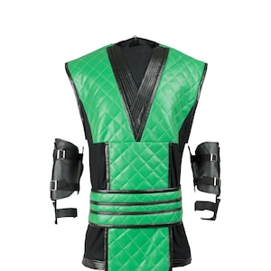 May include: A green and black costume with a quilted design. The costume includes a vest, a belt, and arm guards.