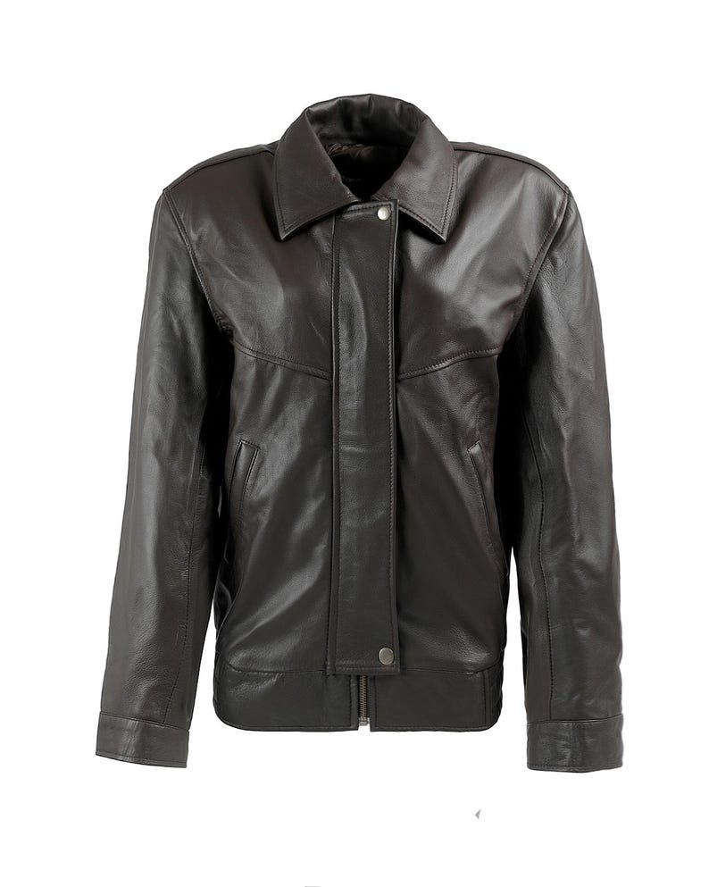 May include: A brown leather jacket with a zipper closure and a stand-up collar.