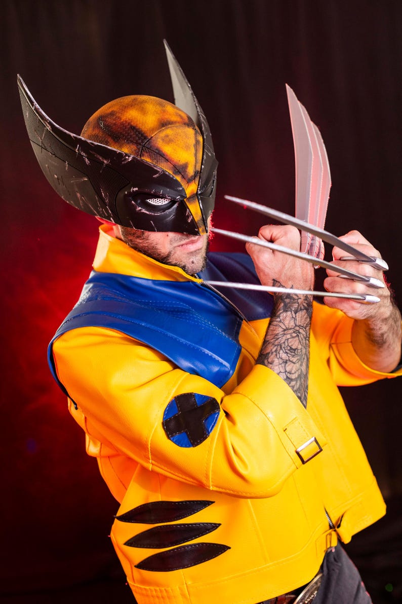 May include: A person dressed as Wolverine, a comic book superhero, wearing a yellow and blue costume with a black mask and claws.