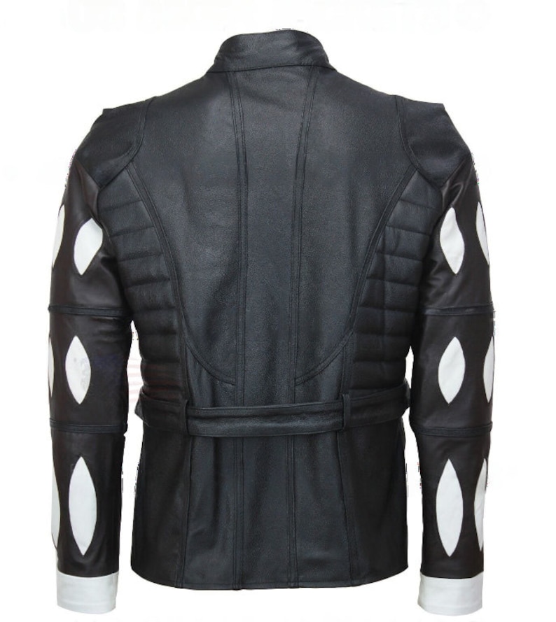 May include: Black leather jacket with white diamond-shaped panels on the sleeves. The jacket has a belt and a stand-up collar.