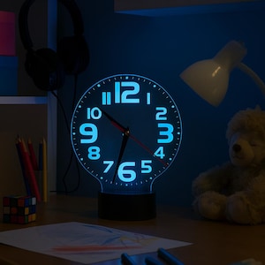 Reloj y lámpara LED de doble función con 16 colores para dormitorio y sala de estar. Ideal como regalo para el hogar o como dispositivo sensorial.