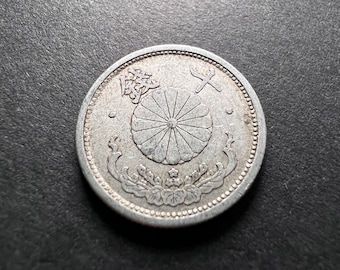One JAPANESE 1947-1948 50 Sen Coin Featuring Imperial