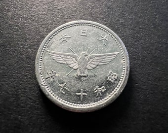 One Japanese WWII Era (1938-1940) Holed 5 Sen Coin Featuring