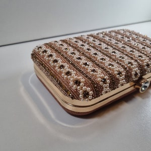 Our Pearl clutch purse collection. A beautiful design in pearl and gold. image 4