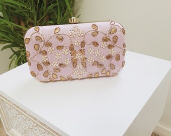 Beautiful clutch purses of stunning designs, riveting colours and unique.; it will make any occasion special.
